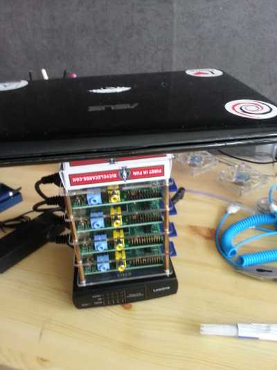 a mini laptop on top of the cluster to keep some pressure on it