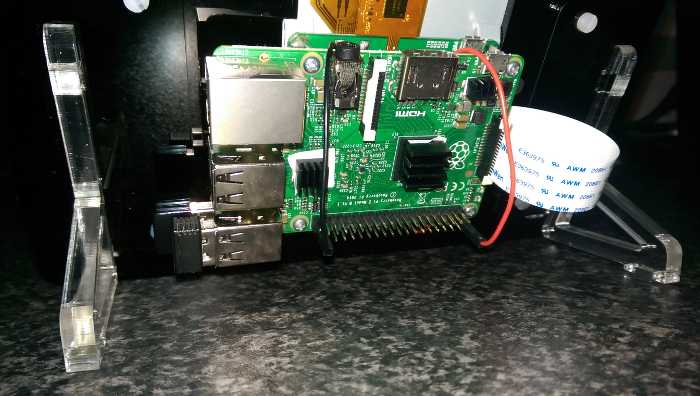 "A picture of the pi bolted to the screen assembly"